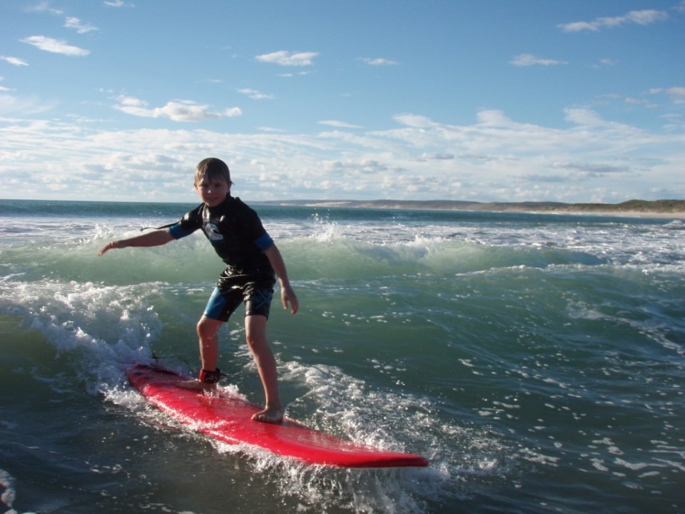Aaron catching waves at Jakes at Kalbarri.