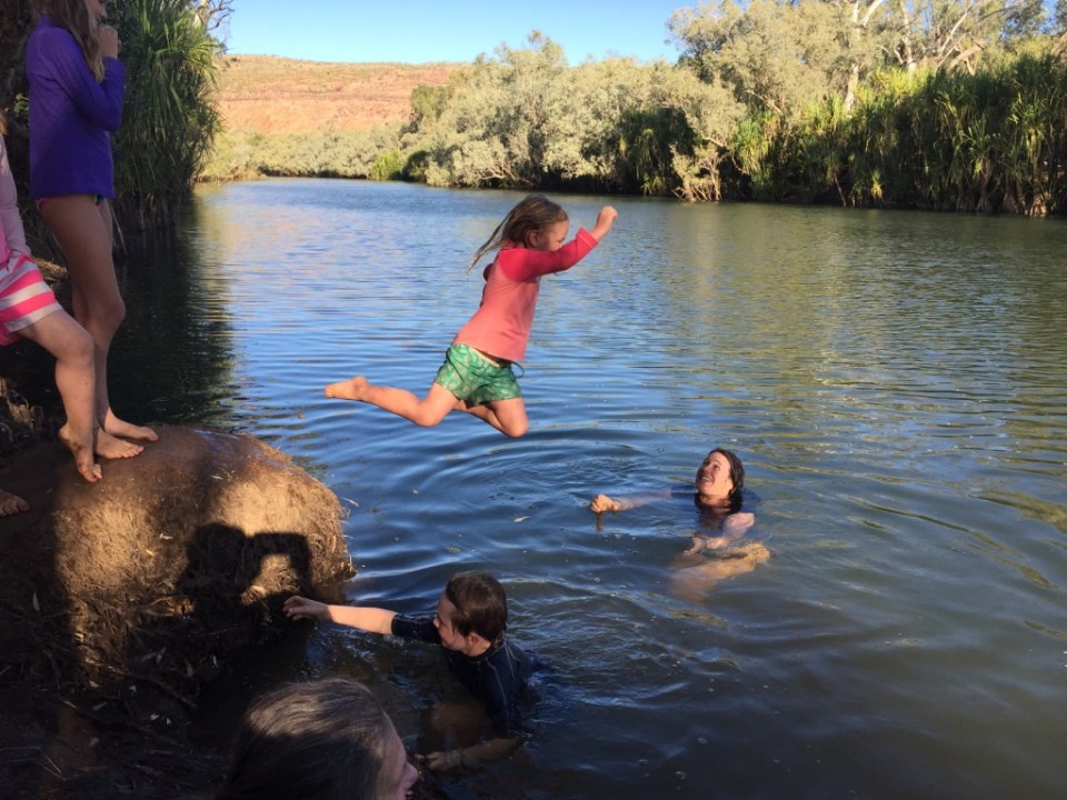 Bianca jumping into the Hann river at Bluebush swim hole