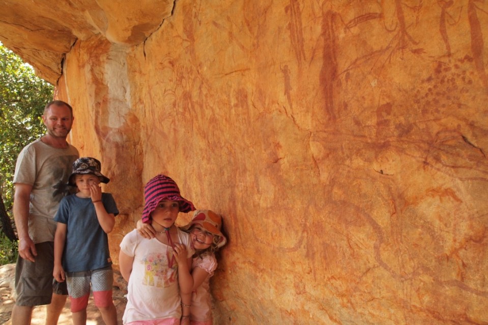 A wall of rock art that had multiple layers of different drawings
