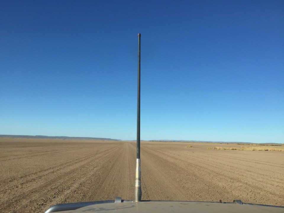 A vast mud flat along the track